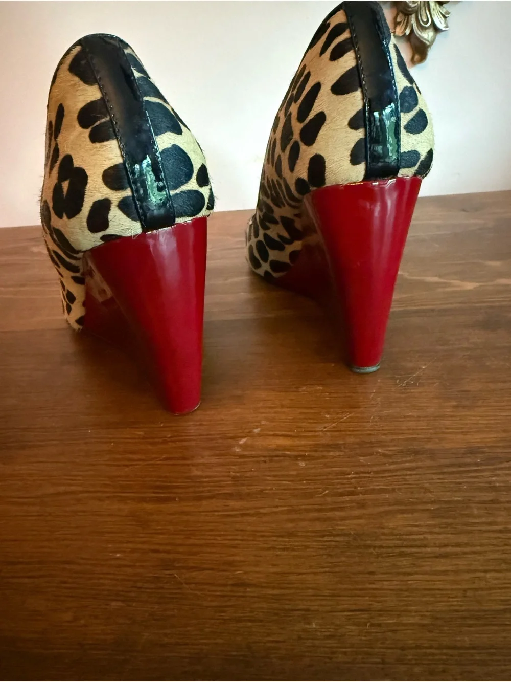 Leopard Print Calf Hair Wedge Pump with Red Heel